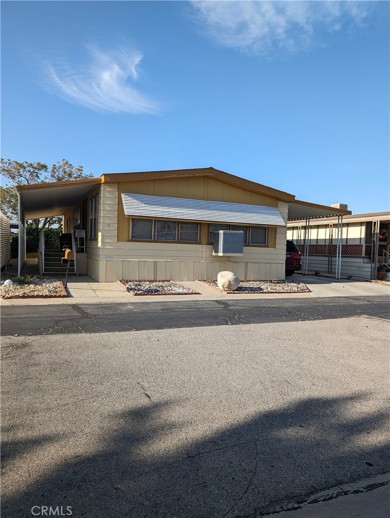 a front view of a building with street view