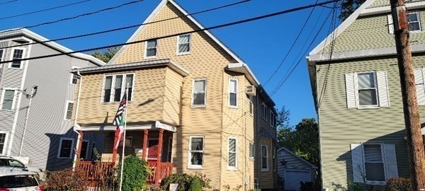 a view of a house with a windows and stairs