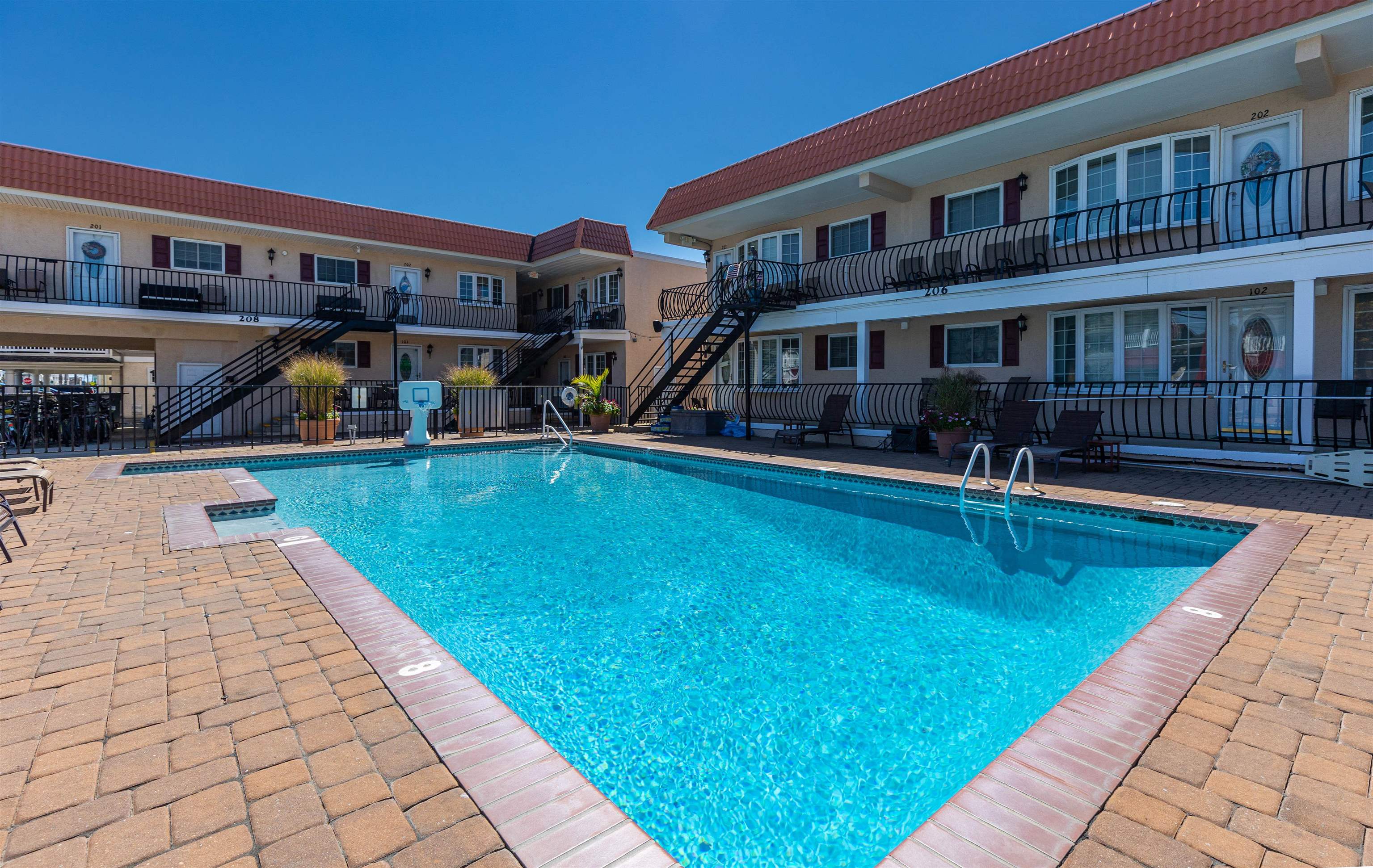 a view of a building with a swimming pool