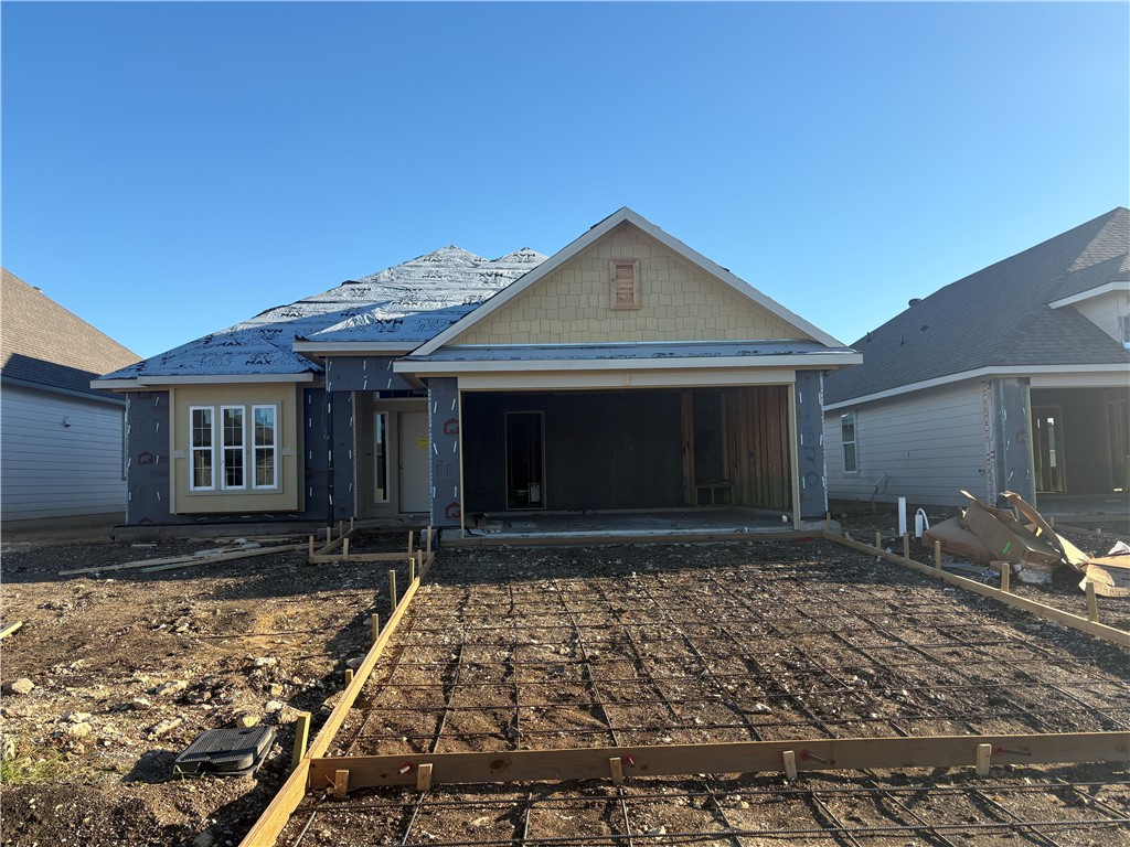 a front view of a house with yard