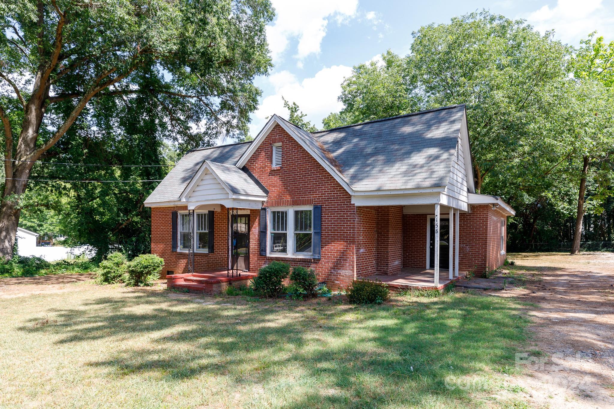 front view of a house with a yard