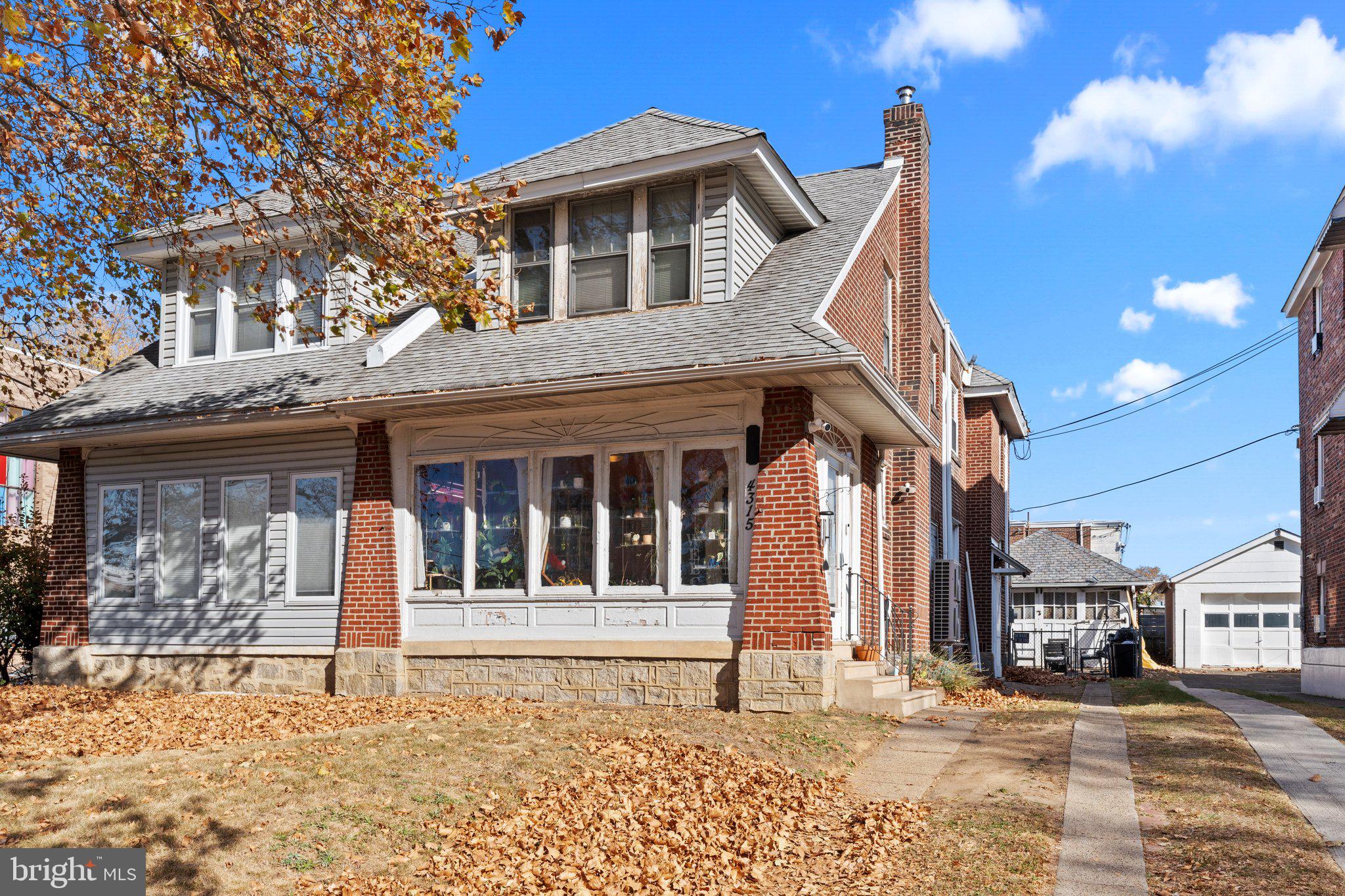 a front view of a house with a porch