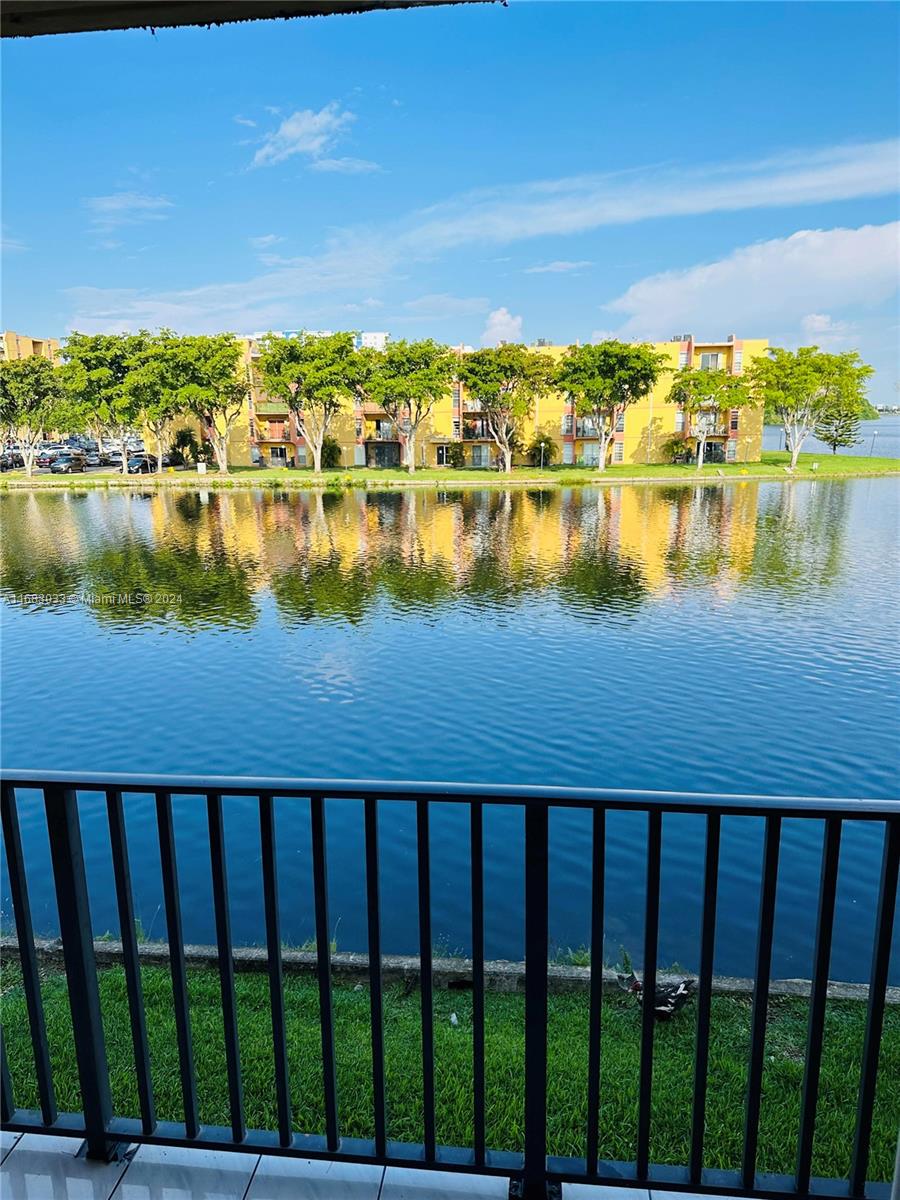 a view of a lake from a balcony