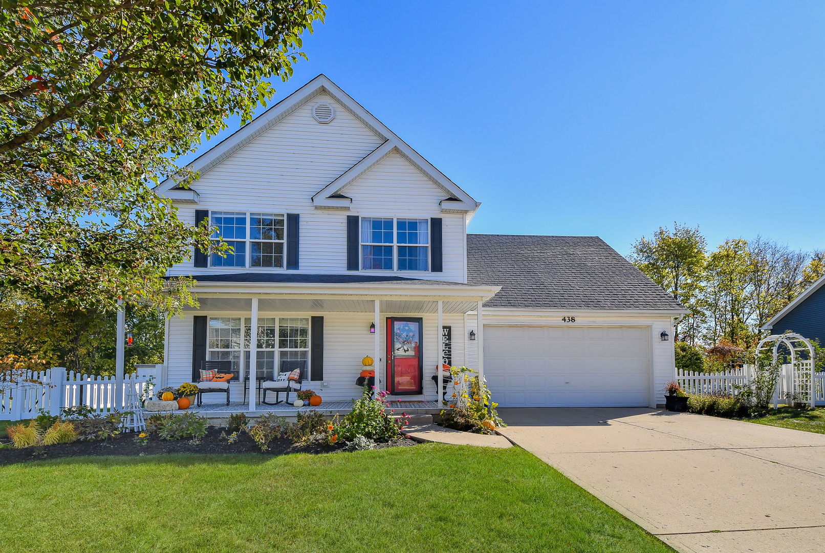 front view of a house with a yard