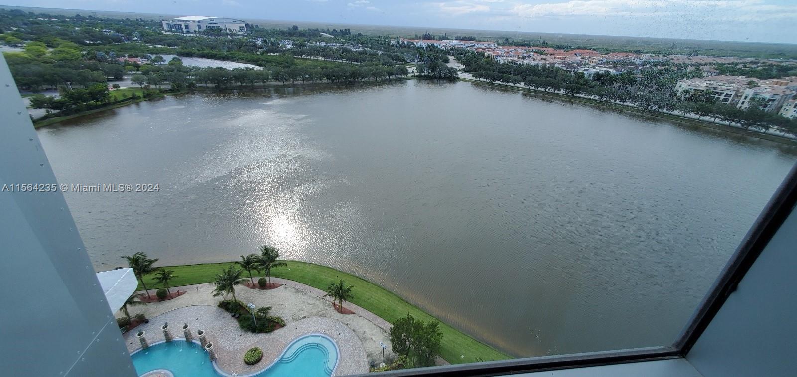 a view of a lake from a balcony