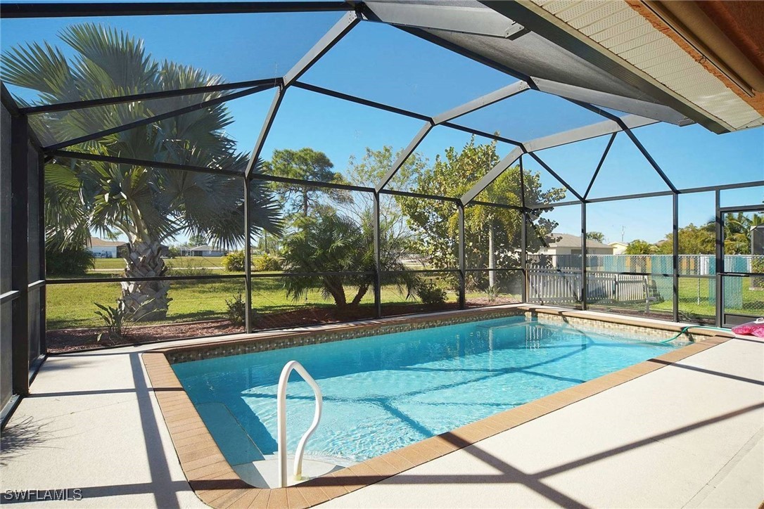 a view of outdoor space with swimming pool