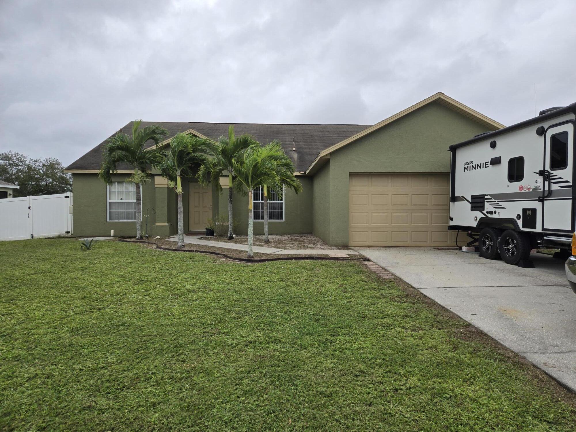 a front view of house with yard