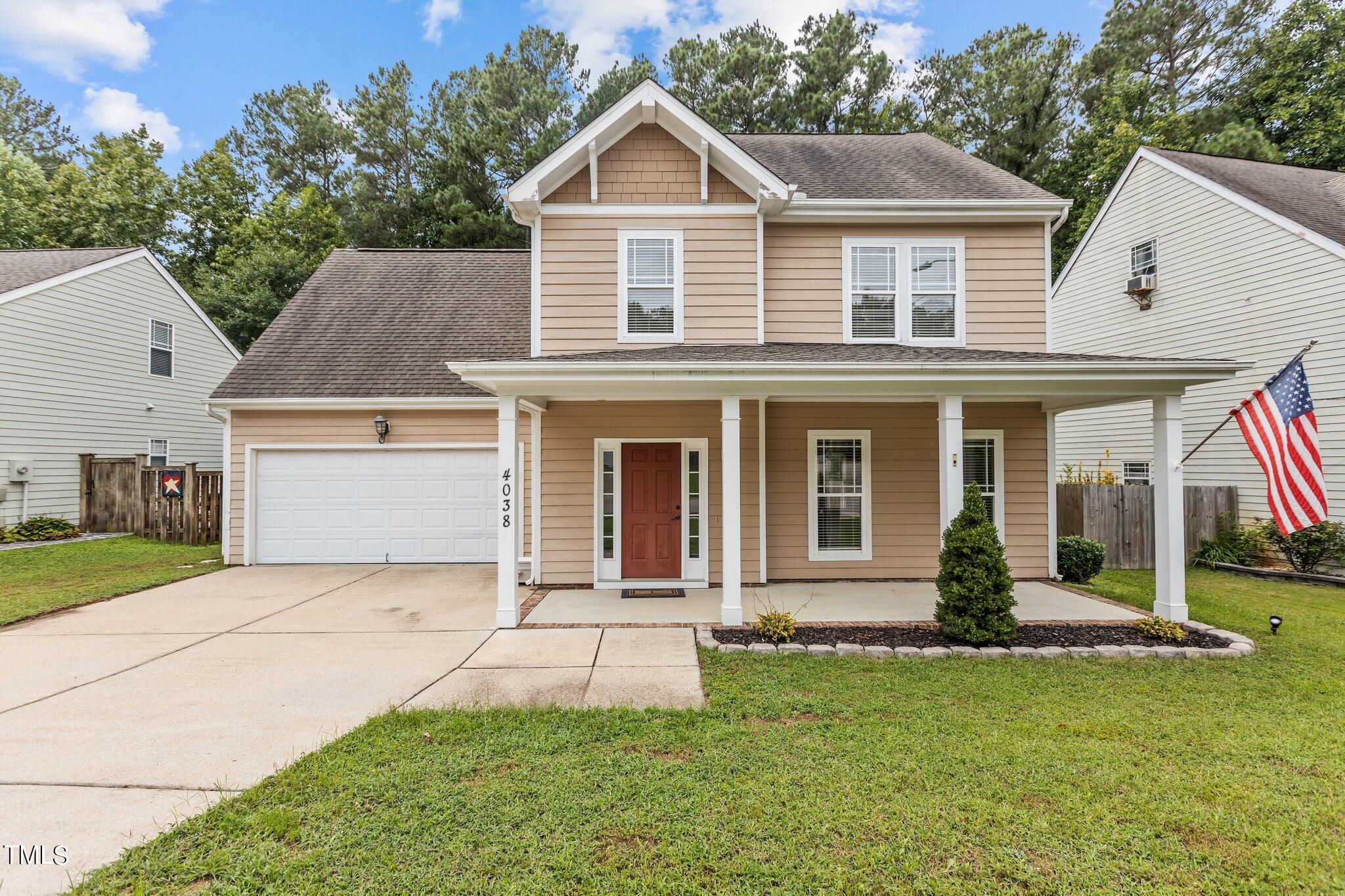 front view of a house with a yard