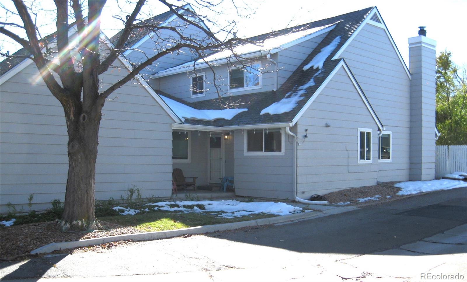 a front view of a house with yard