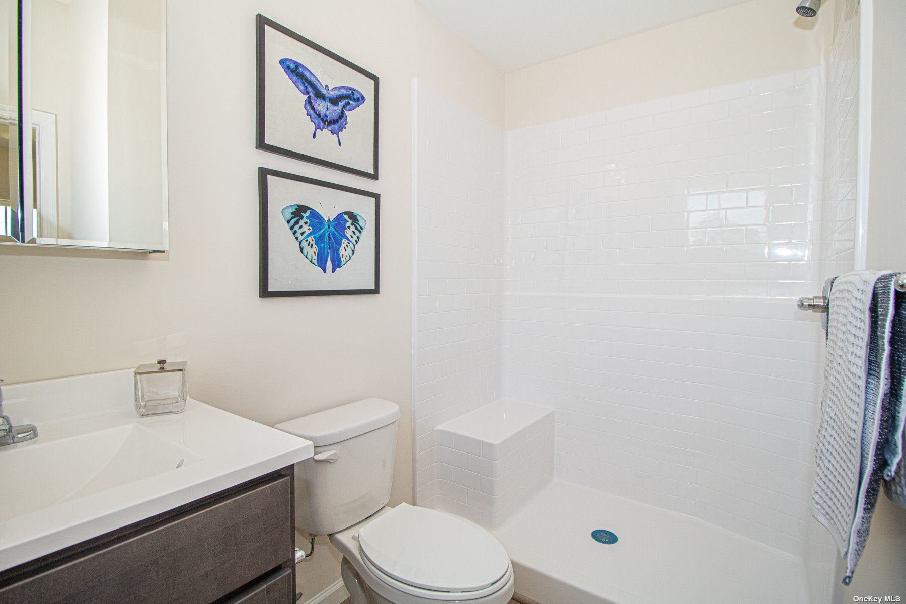 a bathroom with a shower and a toilet