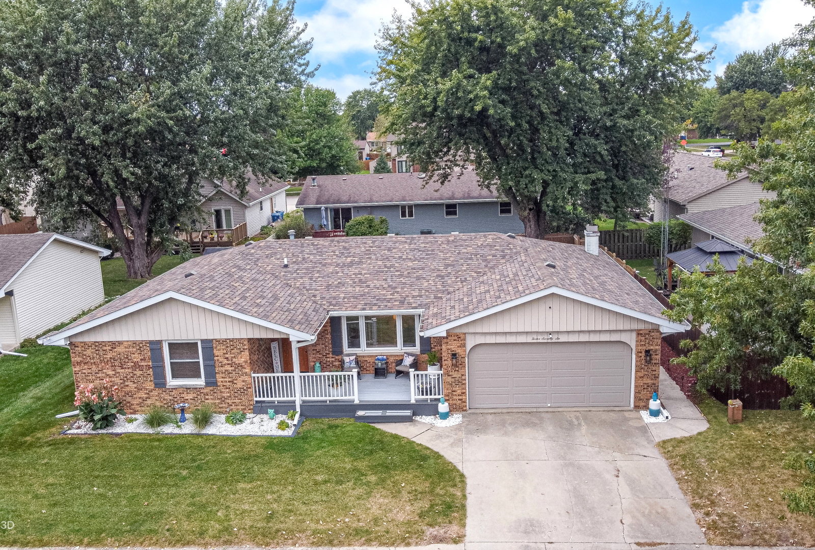 front view of a house with a yard