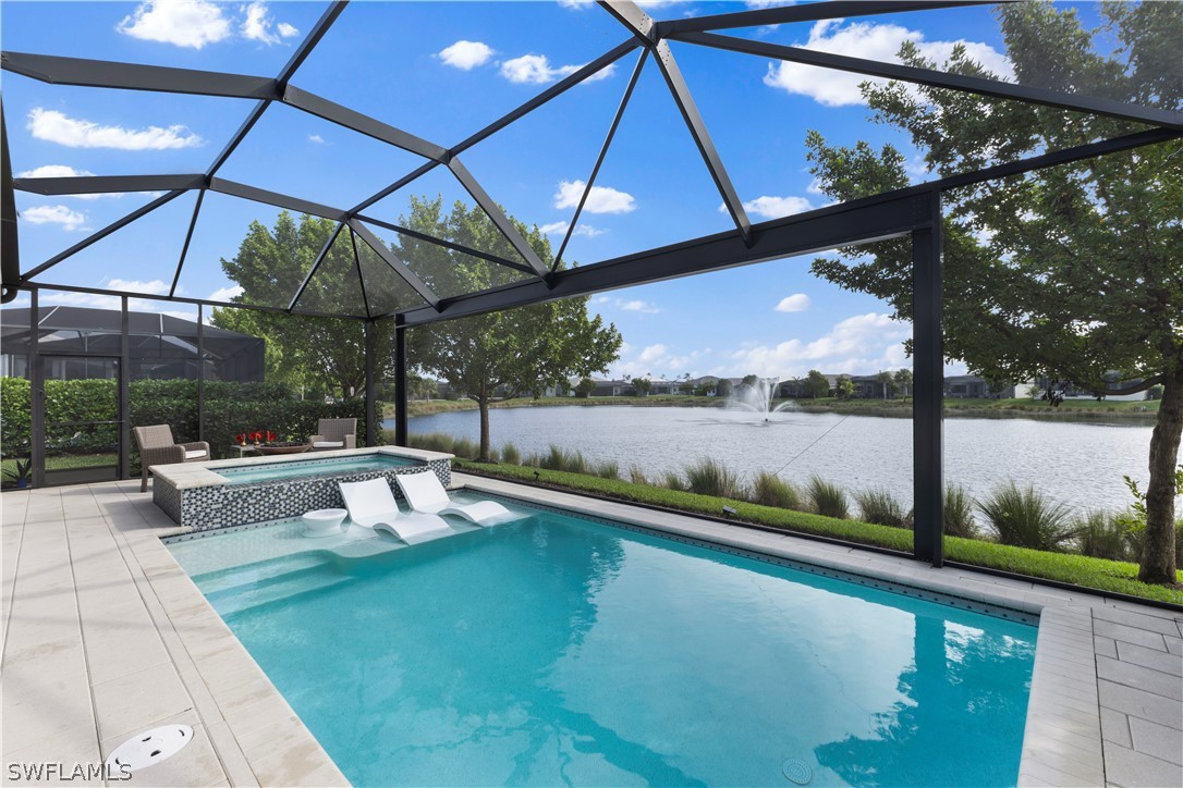 a view of a swimming pool with a patio