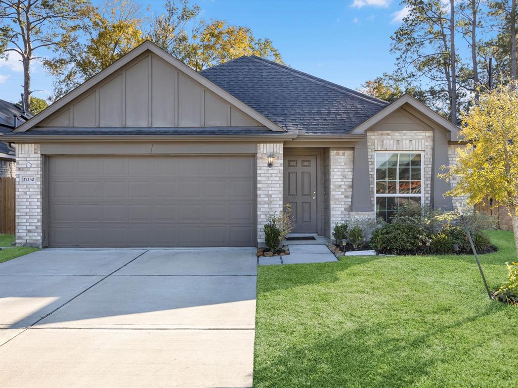 front view of house with a yard