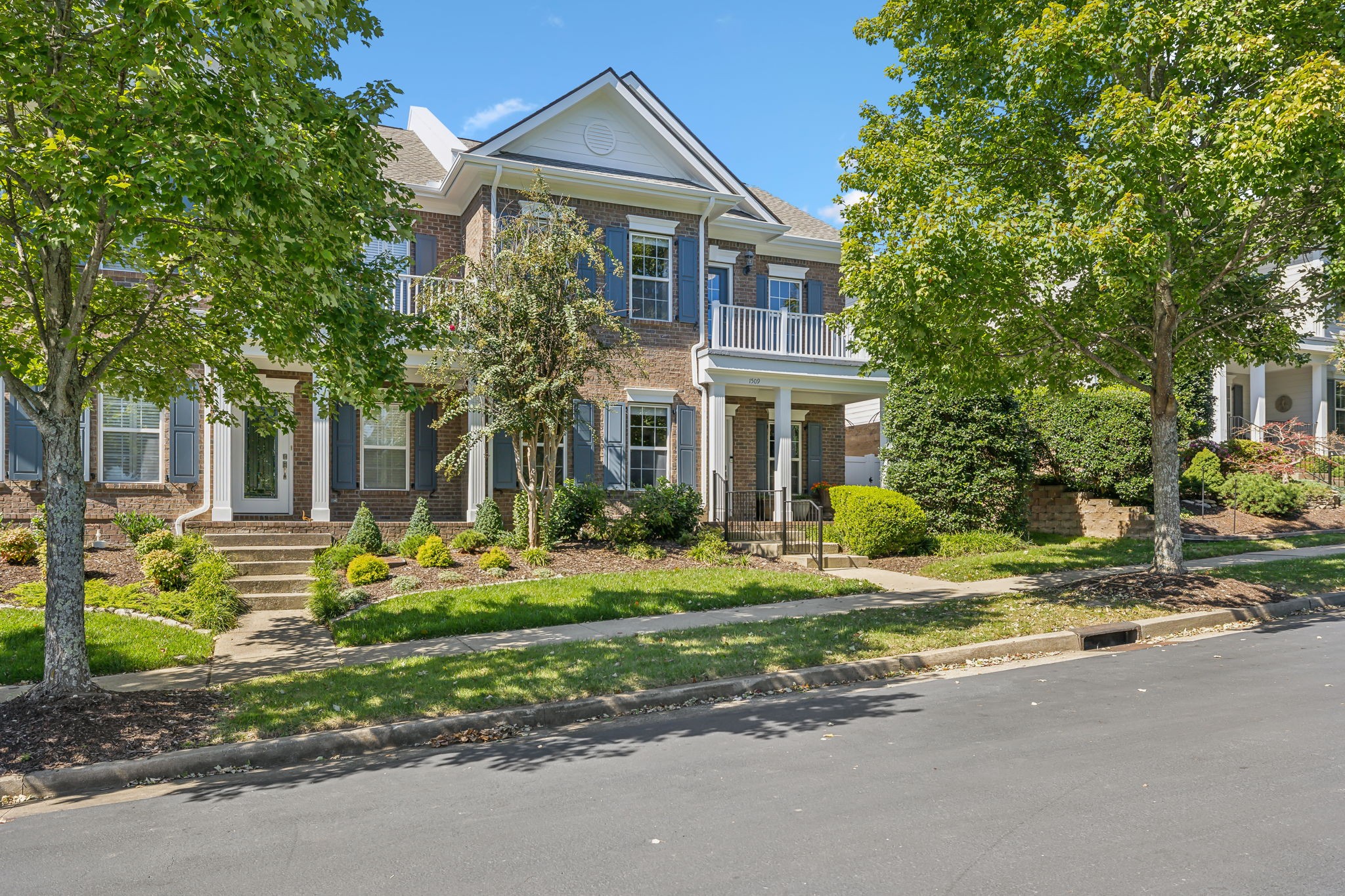 All brick, End Unit, Second Floor Balcony - Former Model