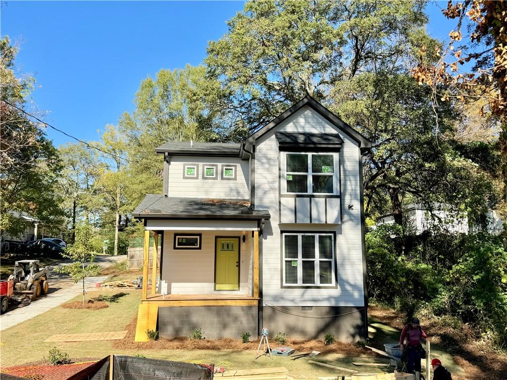 a house with trees in the background