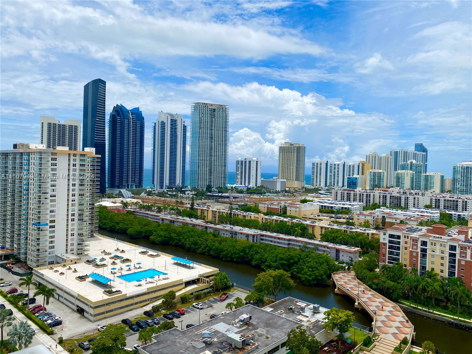 a view of a city with tall buildings