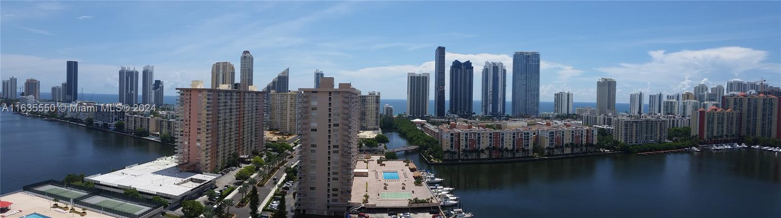 a view of a city with tall buildings