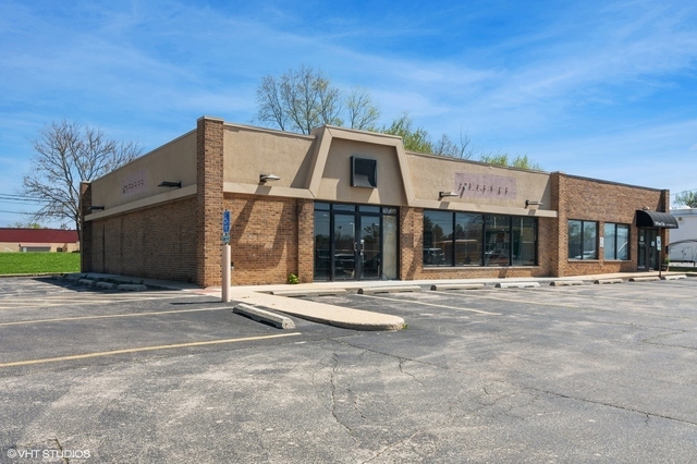 a front view of a building with a outdoor space