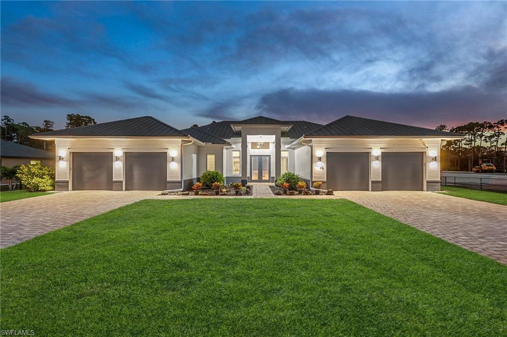 front view of a house with a yard