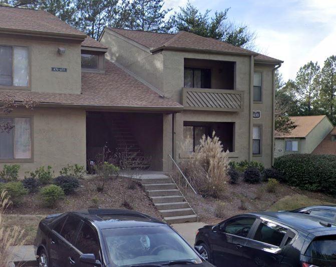 a front view of a house with yard