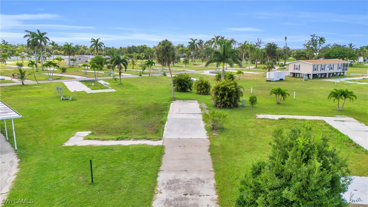 a view of a lake with a big yard