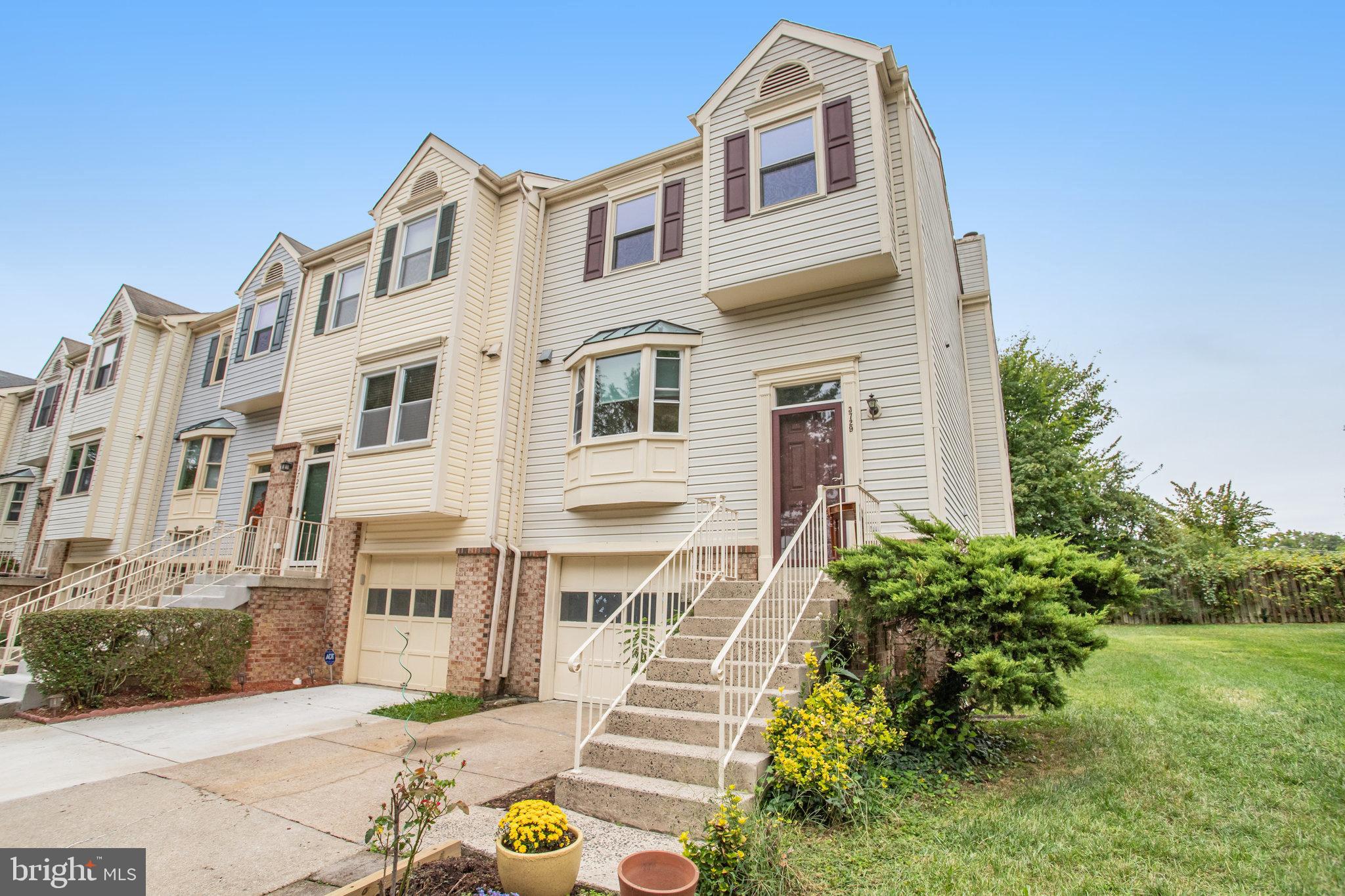 a front view of a multi story residential apartment building