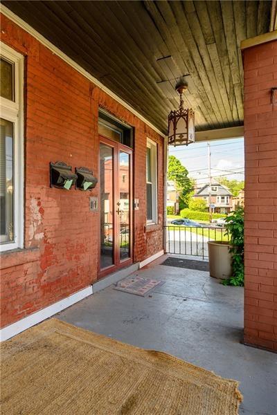 a view of a porch of a house