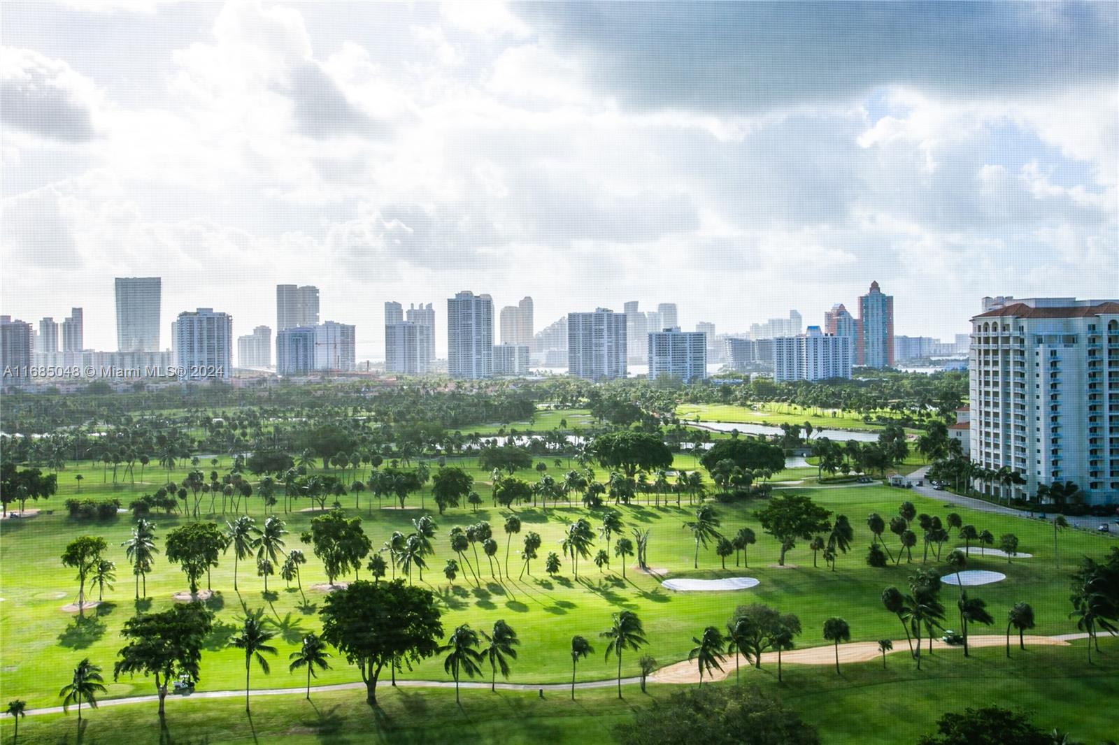 a view of a city with tall buildings