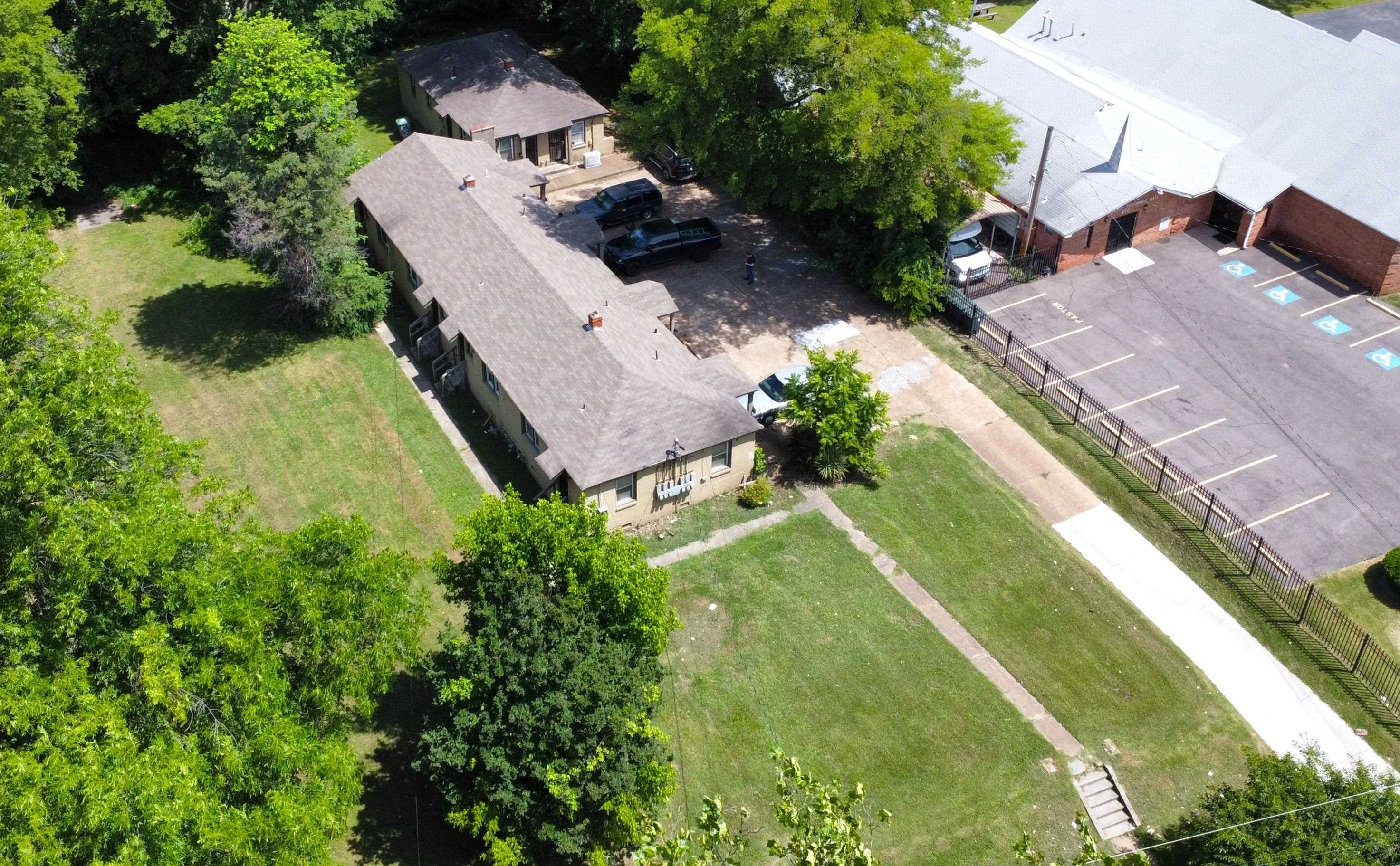 an aerial view of residential house with outdoor space