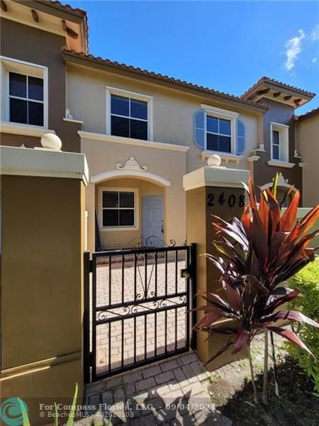 a front view of a house with balcony