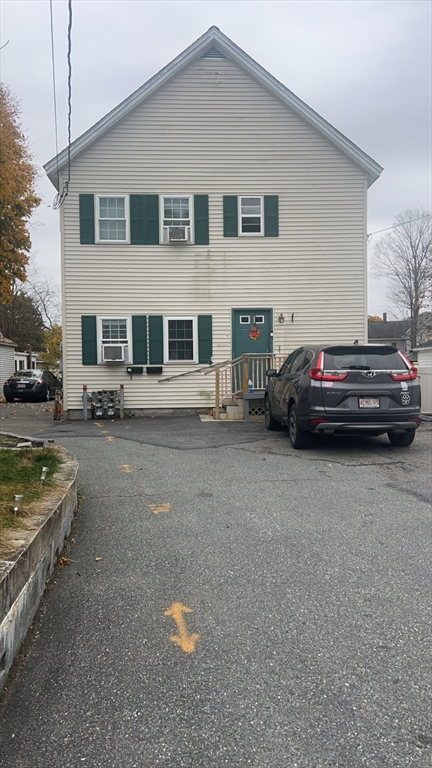 a car parked in front of a house