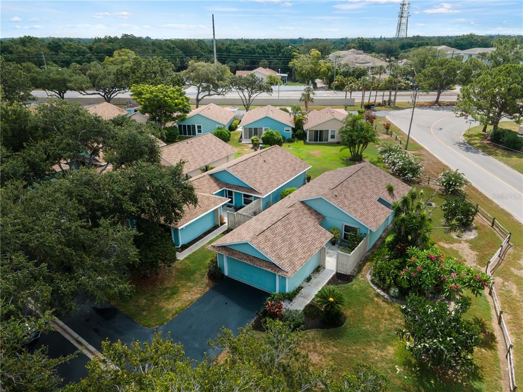 an aerial view of a house with a garden