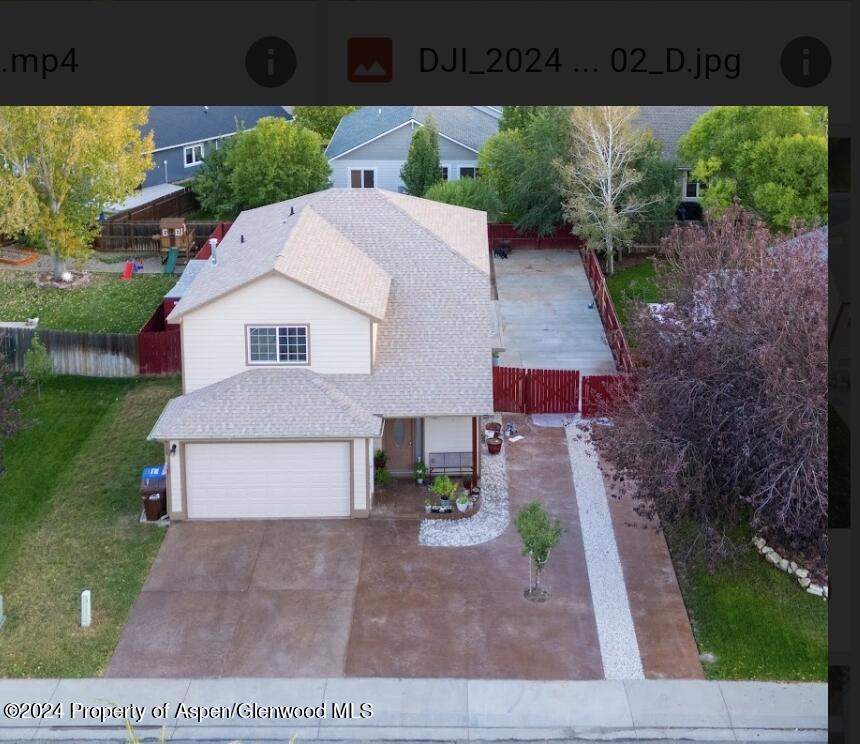 a view of a back yard of the house