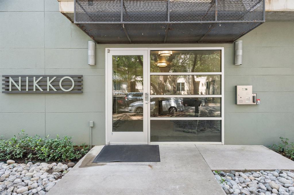 a view of outdoor space and a car garage