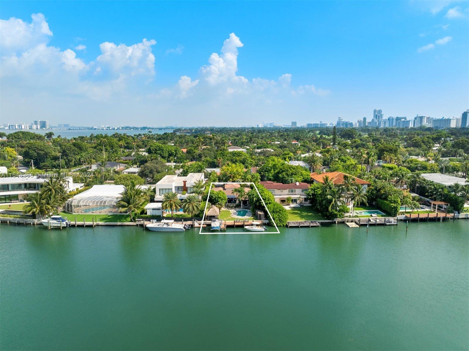 a view of a city with lawn chairs