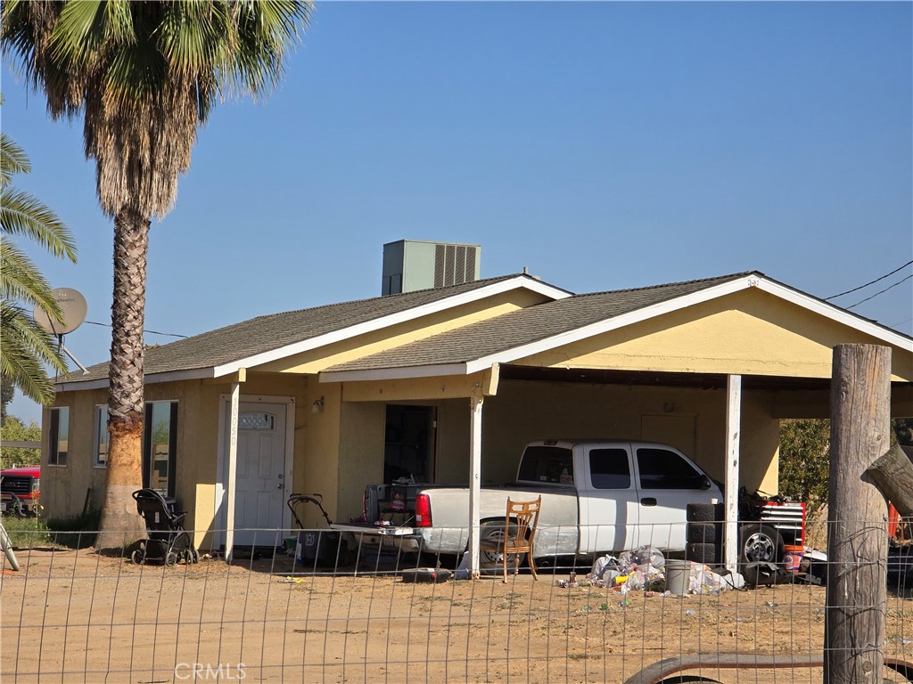 a front view of a house with patio