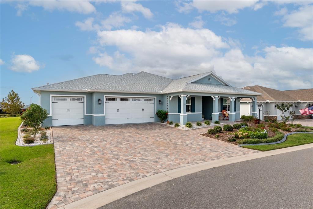 Front View showing 3 car garage