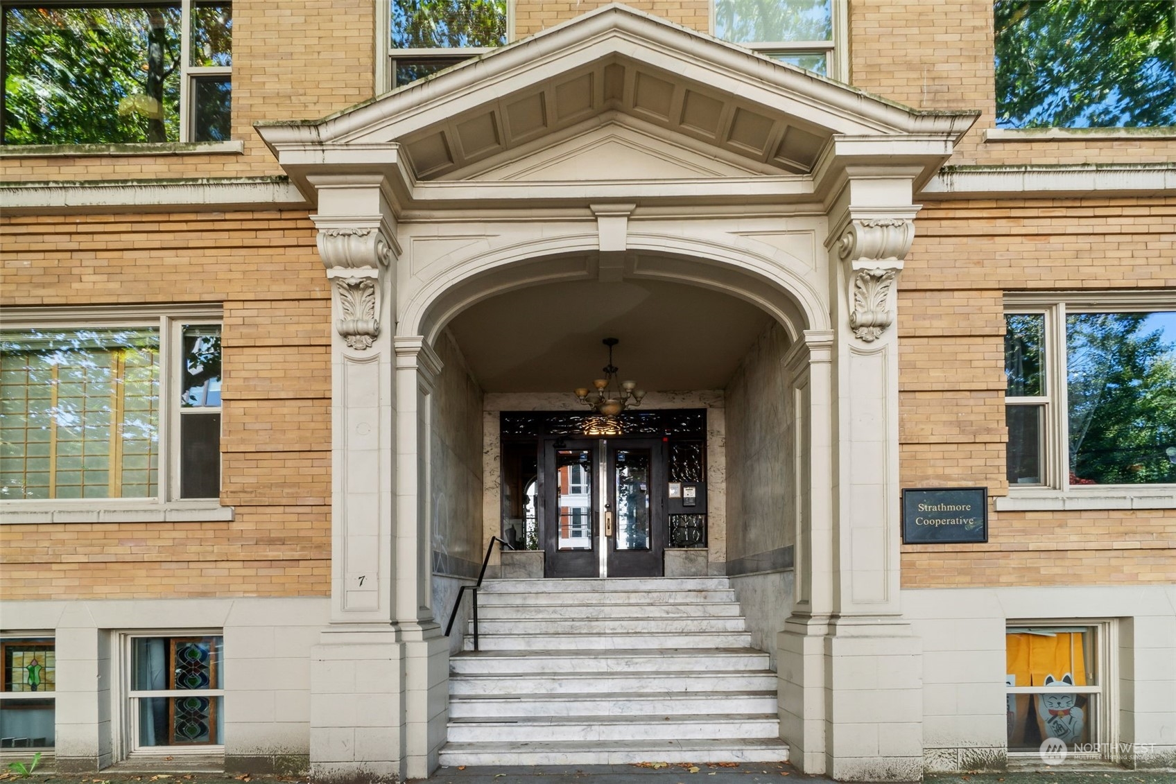 a view of a house with entrance gate