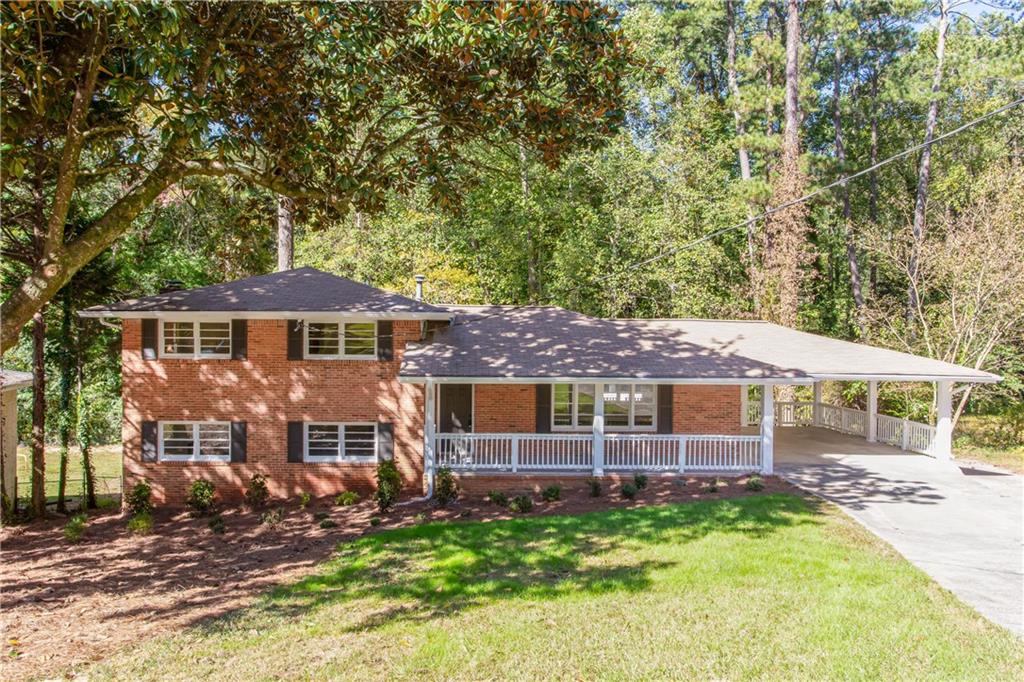 front view of a house with a big yard