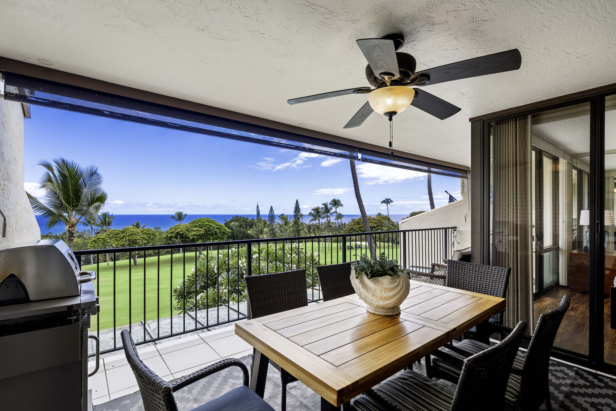 a view of a balcony with furniture