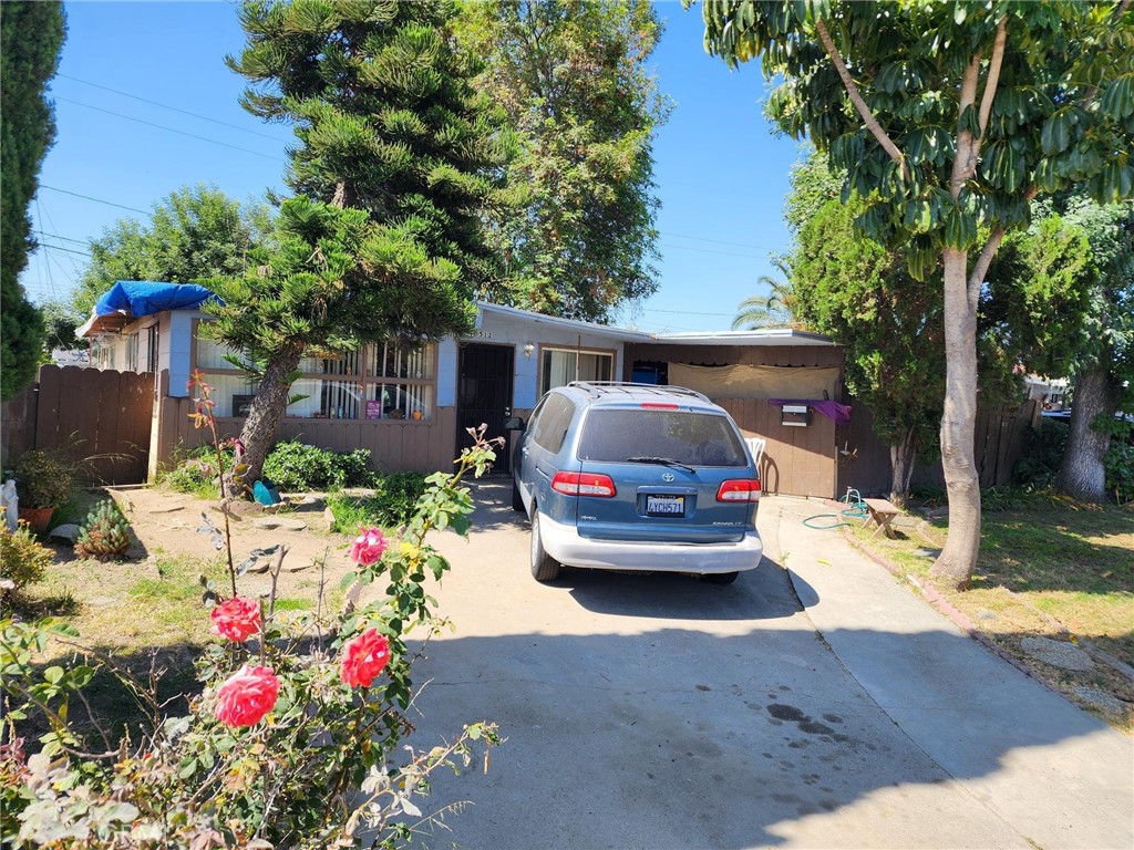 a car parked in front of a house