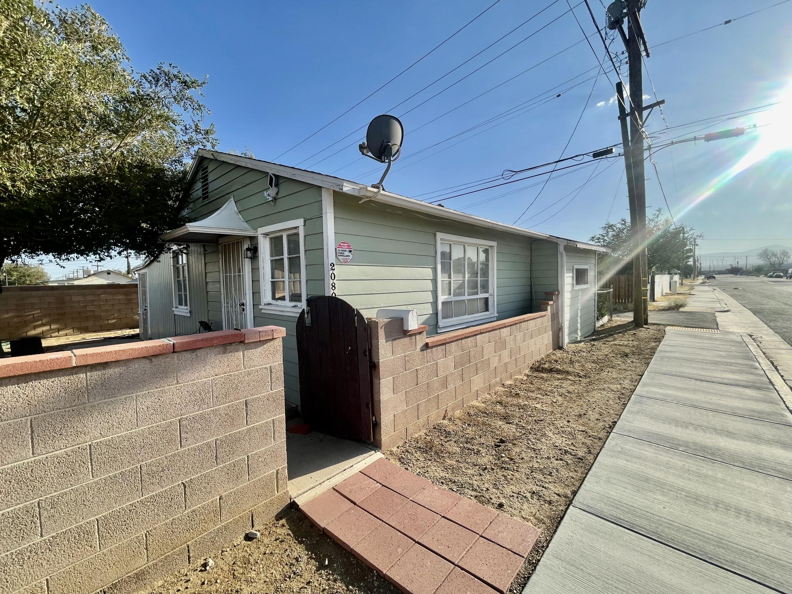 a front view of a house with garage