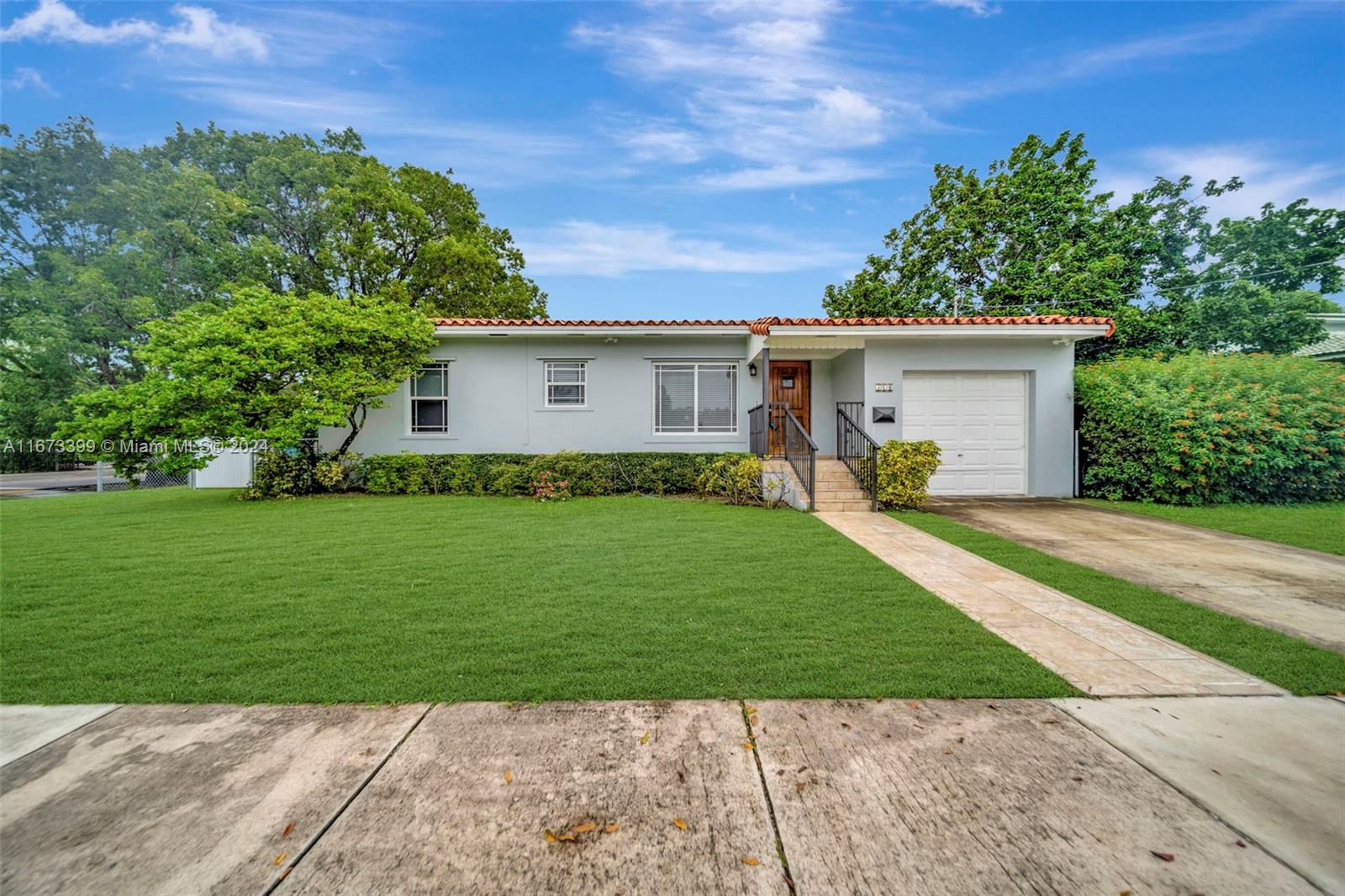 a view of a backyard with a garden