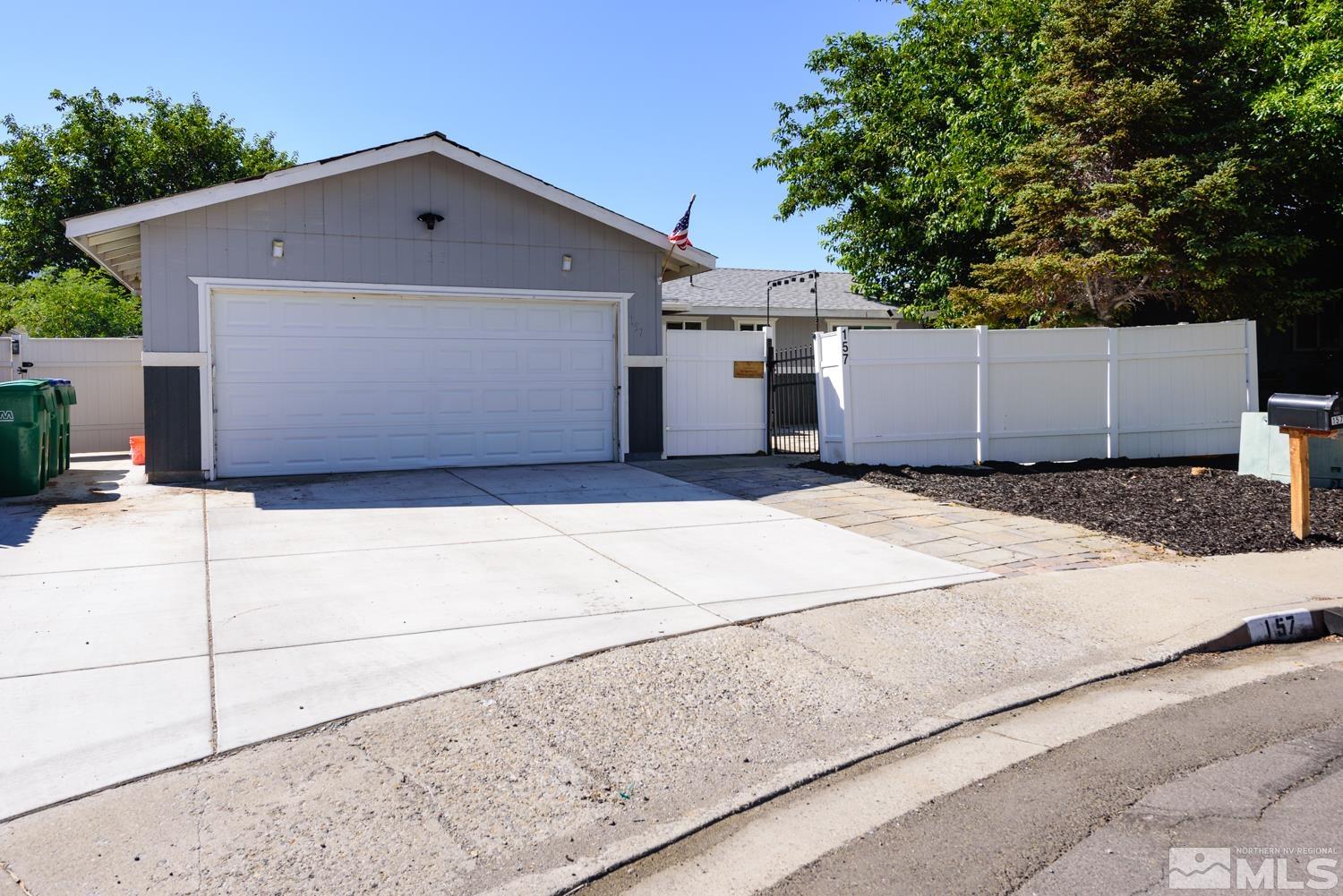 a view of a house with a garage