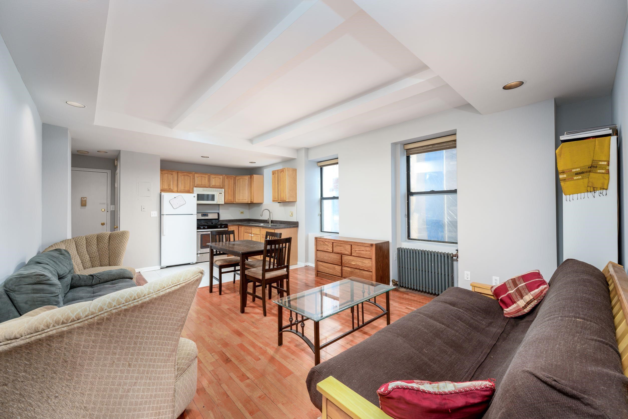 a living room with furniture and a table