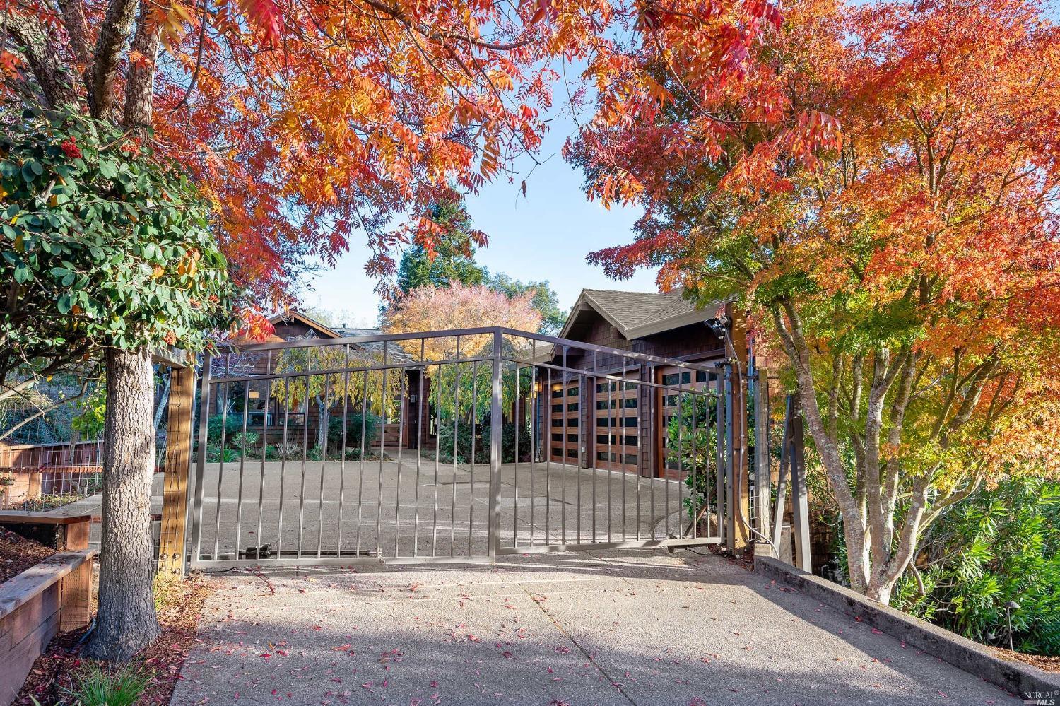 a view of a entrance gate of a house