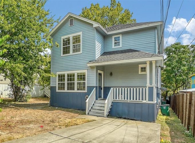 a front view of a house with a garage