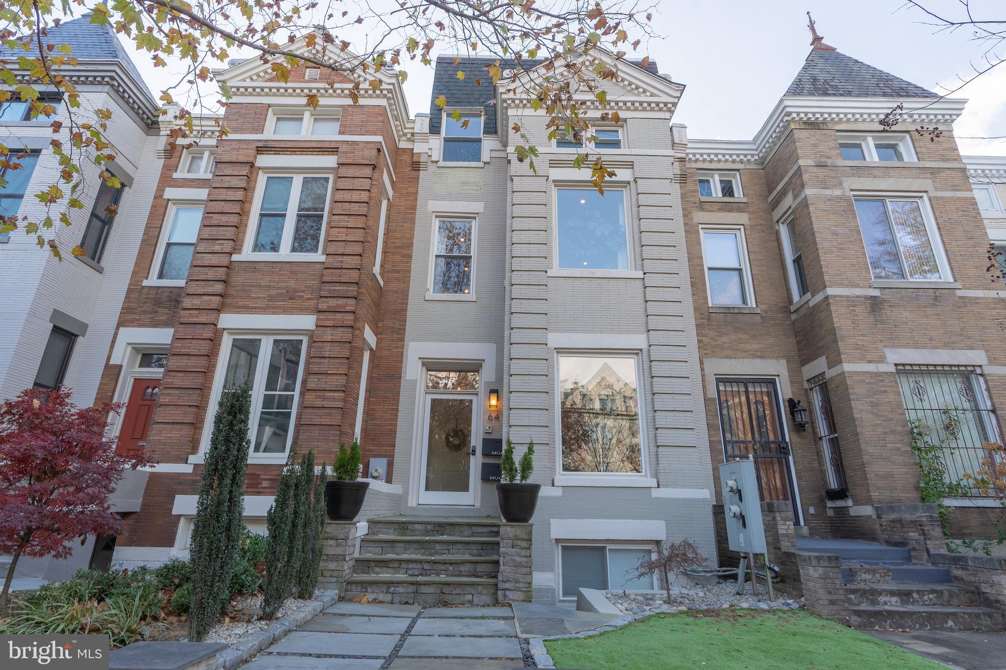 a front view of a multi story residential apartment building