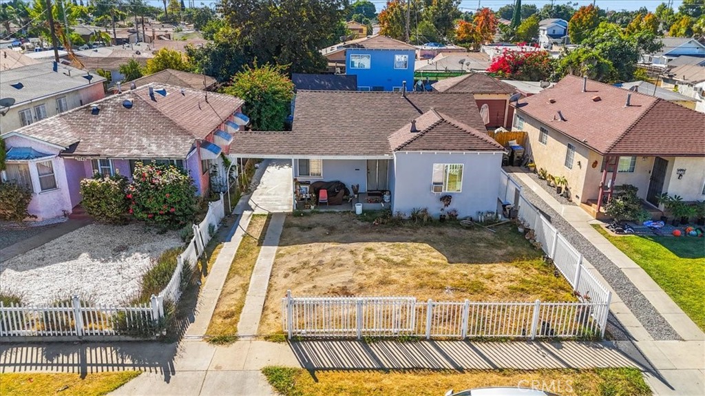 an aerial view of a house with swimming pool