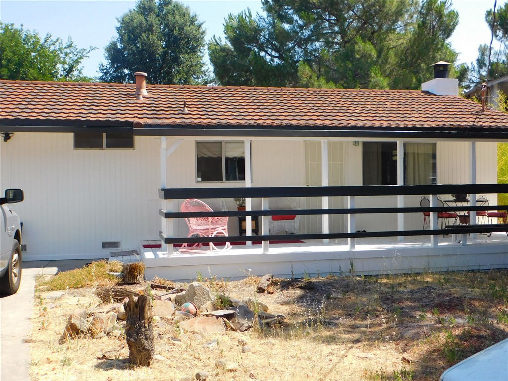 a front view of a house with swimming pool